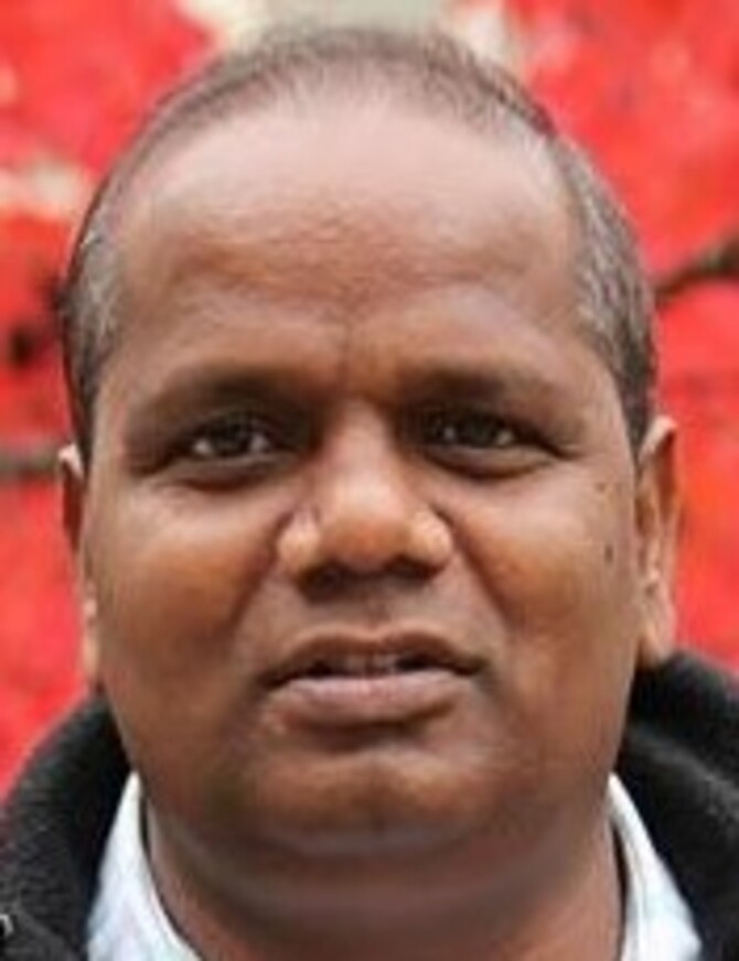 12 . Rev. Fr. L. John Charles Image
